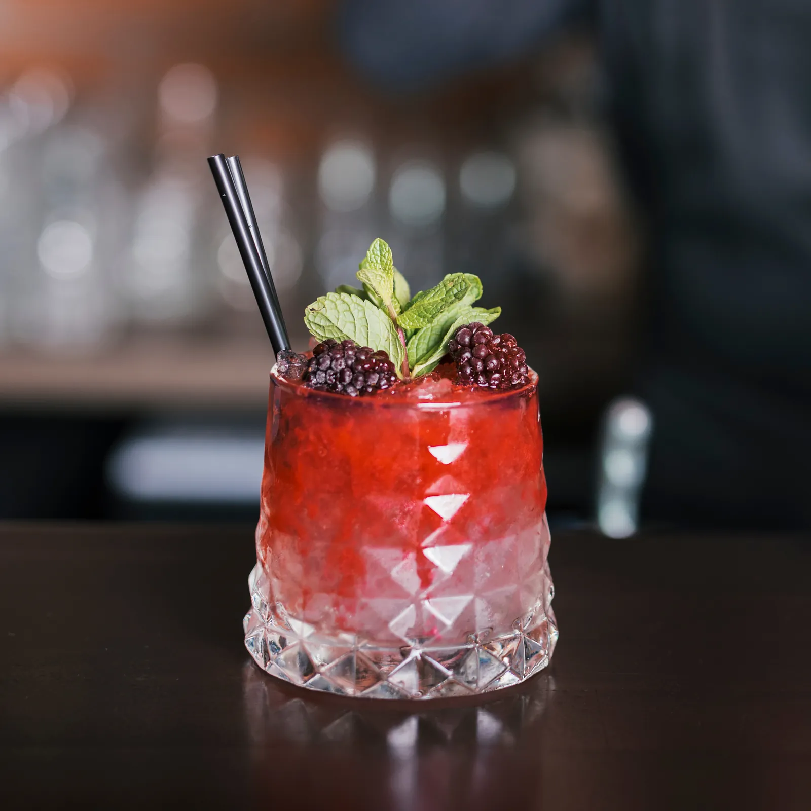 Berry cocktail with mint garnish